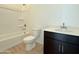 Bathroom featuring a toilet, tub, and single sink vanity at 2446 E Spur Dr, San Tan Valley, AZ 85140