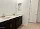 Bathroom with double sink vanity and tiled floors at 2446 E Spur Dr, San Tan Valley, AZ 85140