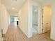 Inviting entryway showcasing wood-look tile floors and abundant natural light at 2446 E Spur Dr, San Tan Valley, AZ 85140