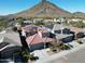 House with solar panels, located in a residential neighborhood near a mountain at 25210 N 54Th Dr, Phoenix, AZ 85083