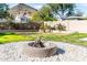 Landscaped backyard with fire pit and mountain view at 25210 N 54Th Dr, Phoenix, AZ 85083