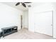 Well-lit bedroom with double door closet and entertainment center at 25210 N 54Th Dr, Phoenix, AZ 85083