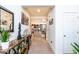 Bright entryway with a console table, mirror, and artwork at 25210 N 54Th Dr, Phoenix, AZ 85083