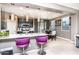 Modern kitchen with island, pendant lights, and dining area at 25210 N 54Th Dr, Phoenix, AZ 85083