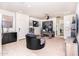 Home office with desk, seating, and large artwork at 25210 N 54Th Dr, Phoenix, AZ 85083