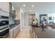 Modern kitchen with stainless steel appliances and an island at 25973 W Horsham Dr, Buckeye, AZ 85396