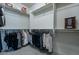 Large walk-in closet with ample hanging space at 25973 W Horsham Dr, Buckeye, AZ 85396