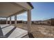 Covered patio overlooking a spacious backyard at 2700 N 216Th Ave, Buckeye, AZ 85396