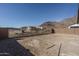 Spacious backyard with a view of a mountain range at 2700 N 216Th Ave, Buckeye, AZ 85396