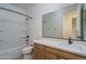 Clean bathroom with a shower/tub combo and modern vanity at 2700 N 216Th Ave, Buckeye, AZ 85396