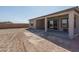 New construction home featuring a covered patio and spacious backyard at 2732 N 217Th Ave, Buckeye, AZ 85396