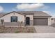 Single-story home with gray exterior, tile roof, and a 2-car garage at 2732 N 217Th Ave, Buckeye, AZ 85396