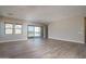 Bright living room with sliding glass doors to backyard at 2732 N 217Th Ave, Buckeye, AZ 85396