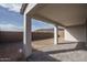 Covered patio with pavers and views of the mountains at 2732 N 217Th Ave, Buckeye, AZ 85396