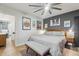 Main bedroom with mid-century modern furniture and en-suite bathroom access at 3105 N 21St St, Phoenix, AZ 85016