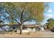 Updated mid-century home with solar panels and a landscaped front yard at 3105 N 21St St, Phoenix, AZ 85016