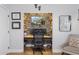 Built-in home office with a desk, chair, and patterned wallpaper at 3105 N 21St St, Phoenix, AZ 85016