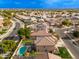 Aerial view of house with pool, showcasing surrounding neighborhood at 3552 E Claxton Ave, Gilbert, AZ 85297