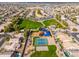 Aerial view of community with park, playground, pickleball courts, and homes at 3552 E Claxton Ave, Gilbert, AZ 85297