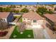 Two-story house with a large backyard, pool and a two-car garage at 3552 E Claxton Ave, Gilbert, AZ 85297