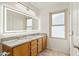 Bathroom with granite countertops and double sinks at 3552 E Claxton Ave, Gilbert, AZ 85297