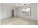 Well-lit bedroom featuring a ceiling fan and closet at 3552 E Claxton Ave, Gilbert, AZ 85297