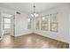 Bright dining area with wood-look floors at 3552 E Claxton Ave, Gilbert, AZ 85297