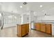 Bright kitchen with granite countertops and wood cabinets at 3552 E Claxton Ave, Gilbert, AZ 85297