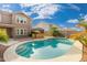 Two-story home with a large kidney-shaped pool in the backyard at 3552 E Claxton Ave, Gilbert, AZ 85297