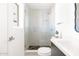 Clean bathroom with glass shower, modern vanity, and pebble floor at 3810 E Shea Blvd, Phoenix, AZ 85028