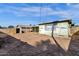 Backyard with shed, block wall, and view of neighboring home at 3821 W Verde Ln, Phoenix, AZ 85019