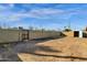 Backyard area with block wall and storage shed at 3821 W Verde Ln, Phoenix, AZ 85019