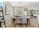 Bright dining area with chandelier and view into the living room at 4364 E Selena Dr, Phoenix, AZ 85050