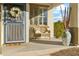 Inviting front porch with wicker chair and decorative accents at 4364 E Selena Dr, Phoenix, AZ 85050