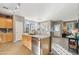 Open kitchen island with sink, dishwasher and view into the dining area at 4364 E Selena Dr, Phoenix, AZ 85050