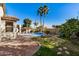 Landscaped backyard with pool and patio area at 4795 E Bellerive Dr, Chandler, AZ 85249