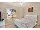 Bright bedroom with a view and comfortable bedding at 4795 E Bellerive Dr, Chandler, AZ 85249