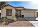 Single-story home with attractive landscaping and a two-car garage at 4795 E Bellerive Dr, Chandler, AZ 85249