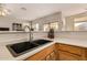 Modern kitchen sink with a sleek faucet and butcher block at 4795 E Bellerive Dr, Chandler, AZ 85249