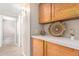 Hallway features wood cabinetry and decor at 5121 W Jupiter Way, Chandler, AZ 85226