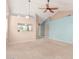 Large living room with vaulted ceilings and a ceiling fan at 5121 W Jupiter Way, Chandler, AZ 85226