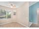 Inviting living area with lots of natural light and a ceiling fan at 5121 W Jupiter Way, Chandler, AZ 85226