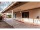 Covered patio with red flowers at 5121 W Jupiter Way, Chandler, AZ 85226