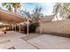 A secluded patio with a brick wall at 5121 W Jupiter Way, Chandler, AZ 85226