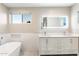 Bathroom boasts double vanity and a free standing tub at 5429 E Bloomfield Rd, Scottsdale, AZ 85254