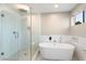 Modern bathroom with a soaking tub and walk-in shower at 5429 E Bloomfield Rd, Scottsdale, AZ 85254