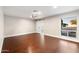 Bright bedroom with hardwood floors and sliding barn door at 5429 E Bloomfield Rd, Scottsdale, AZ 85254