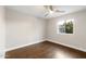 Bedroom with hardwood floors and a window at 5429 E Bloomfield Rd, Scottsdale, AZ 85254