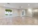 Bright and airy living room with tile floors and large window at 5429 E Bloomfield Rd, Scottsdale, AZ 85254