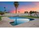 Inviting rectangular pool with grassy area and playset at 5429 E Bloomfield Rd, Scottsdale, AZ 85254